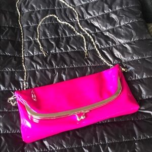 hot pink patent leather clutch